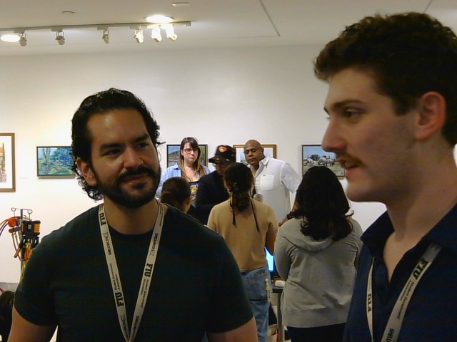 Talking through JARVIS with a visitor at the table